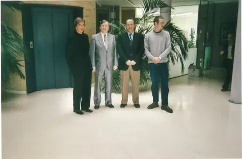 Karpov with the organisers, 2000
